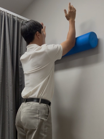 shoulder bursa exercises - foam roller wall slide